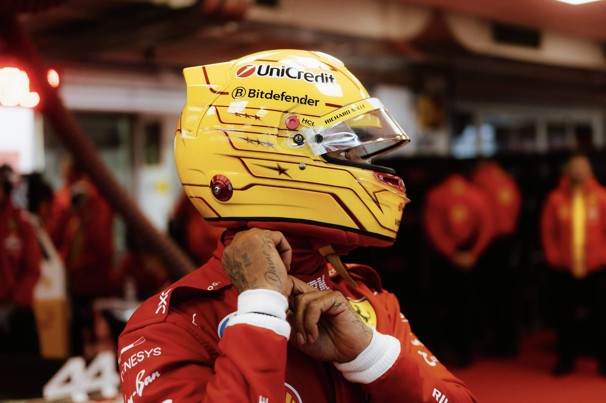 Lewis gearing up for his first drive in a Ferrari F1 car