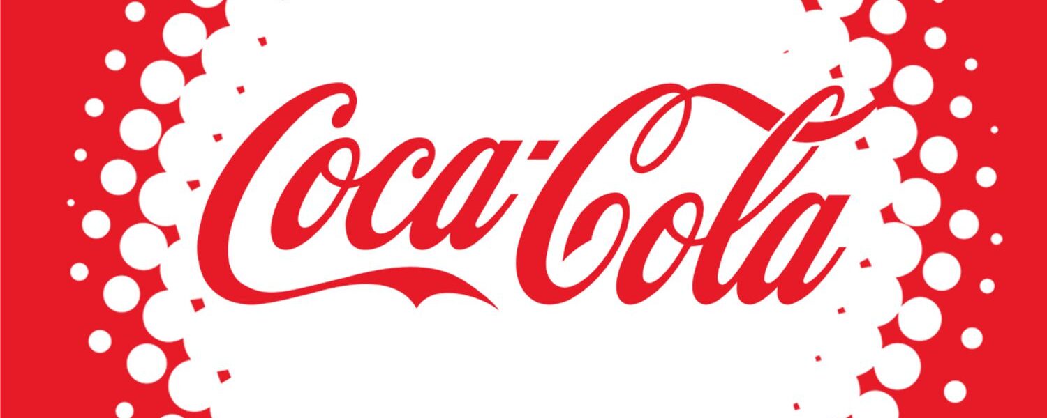 Red and white spotted background with cursive writing " Coca Cola"