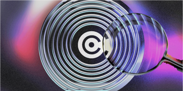 A magnifying glass highlighting a portion of a record with the copyright logo plastered on it.