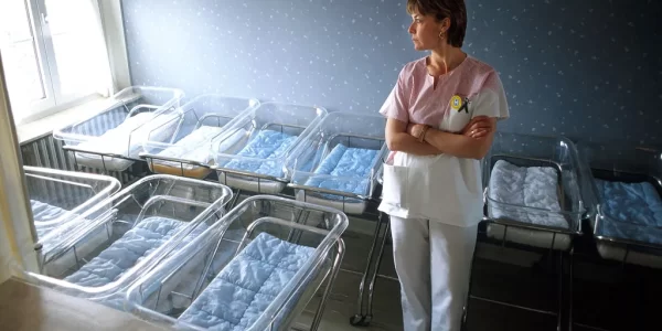 woman in an empty maternity ward